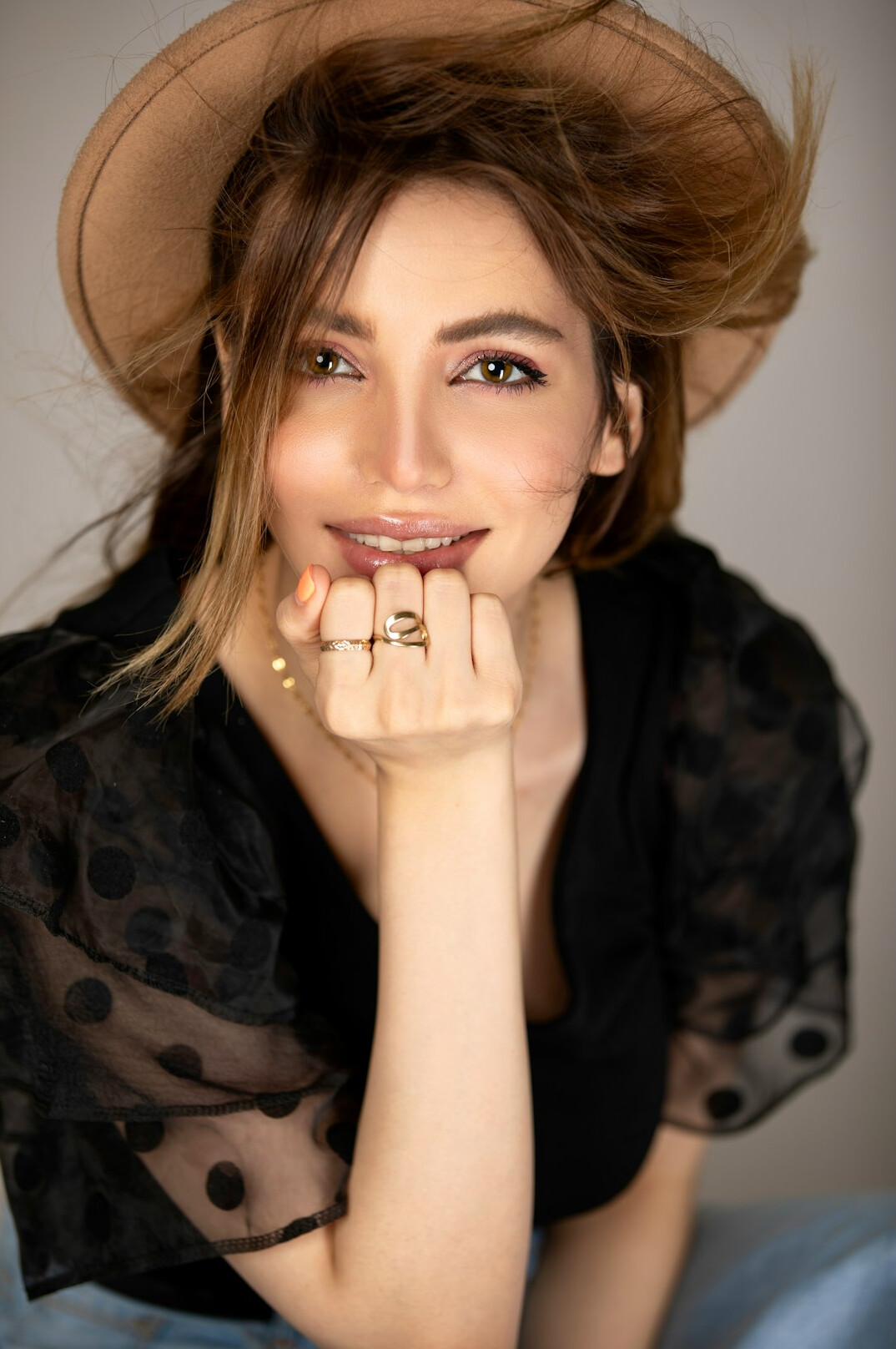Studio portrait of a European woman journalist smiling