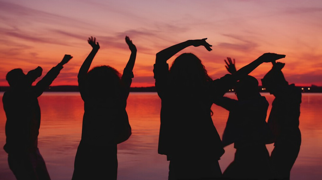 people dancing at outdoor party