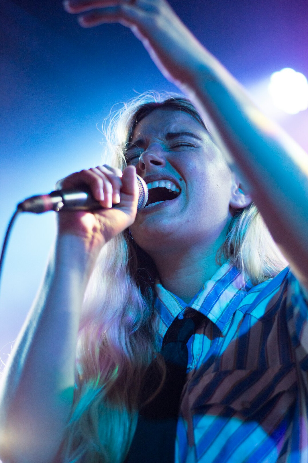 singer on stage performing