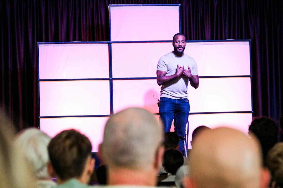 influential businessman speaking at event