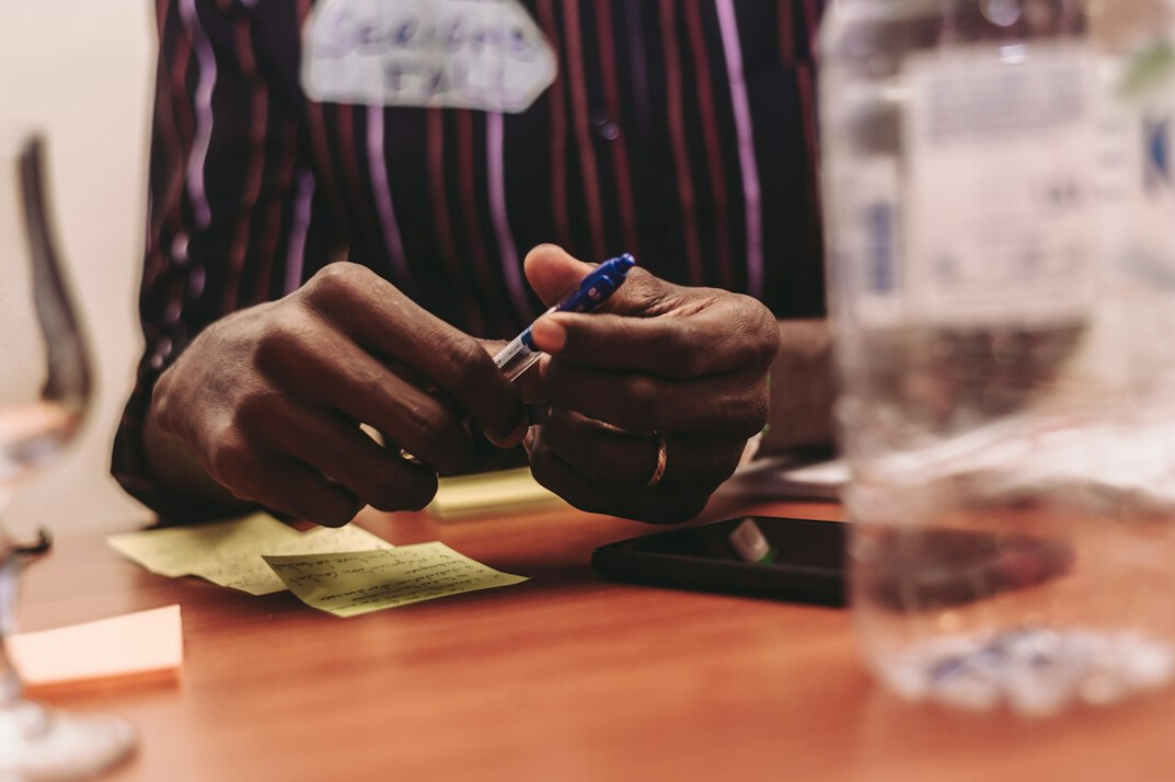 person reviewing financial papers