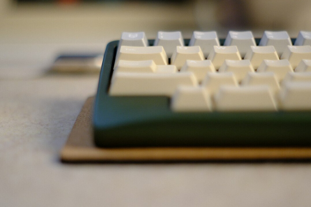 Vintage typewriter with a sheet of paper on a wooden desk