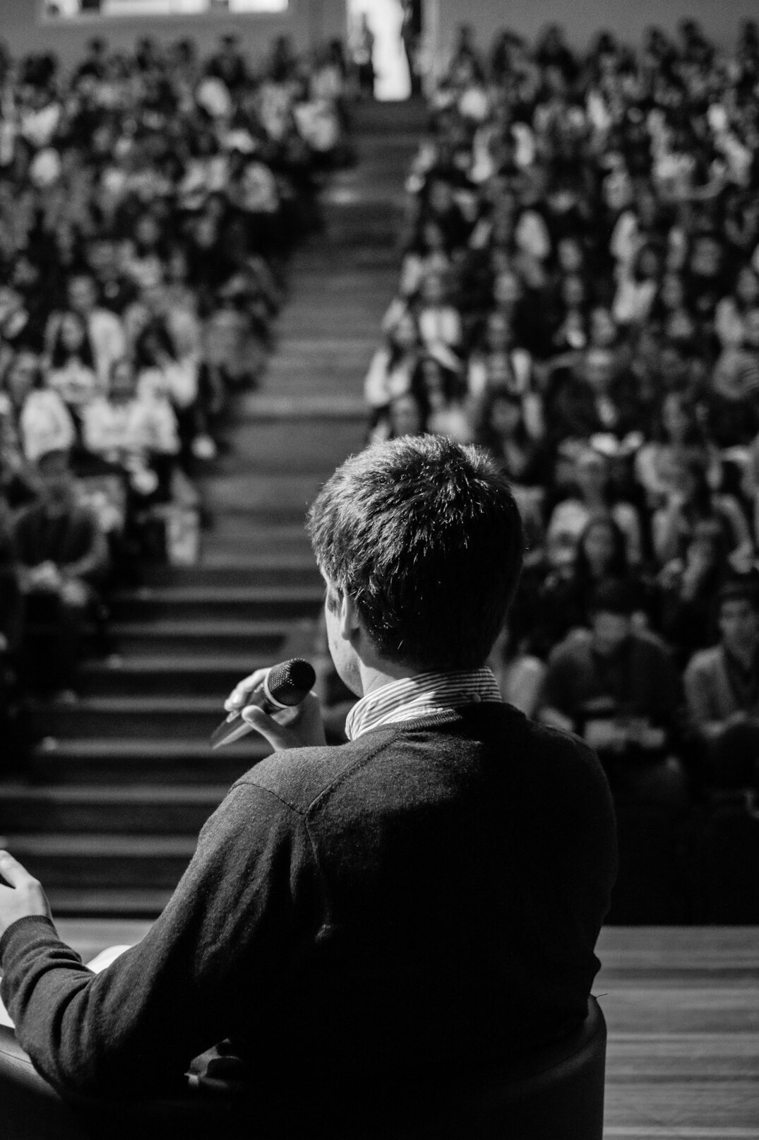 influential businessman speaking at event